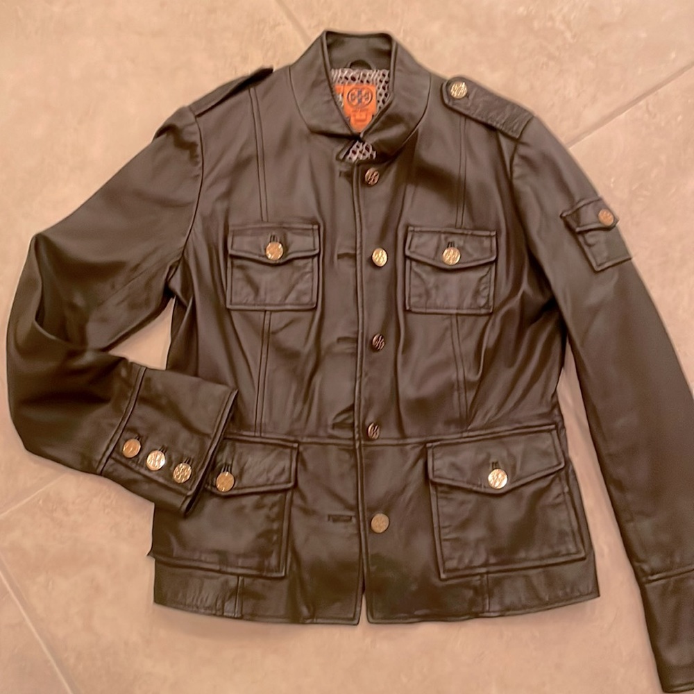 Tory Burch leather jacket with gold buttons with emblem on buttons.